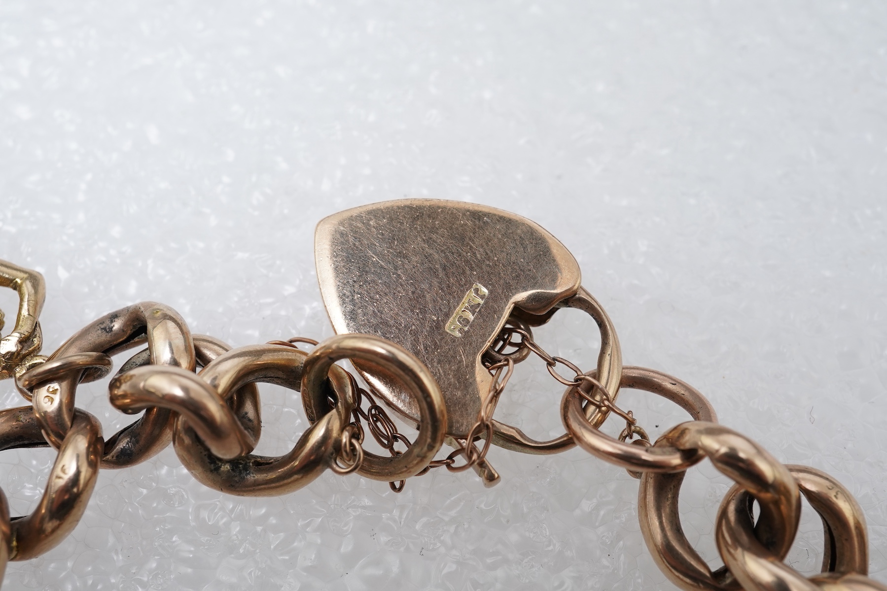 A 9ct gold charm bracelet